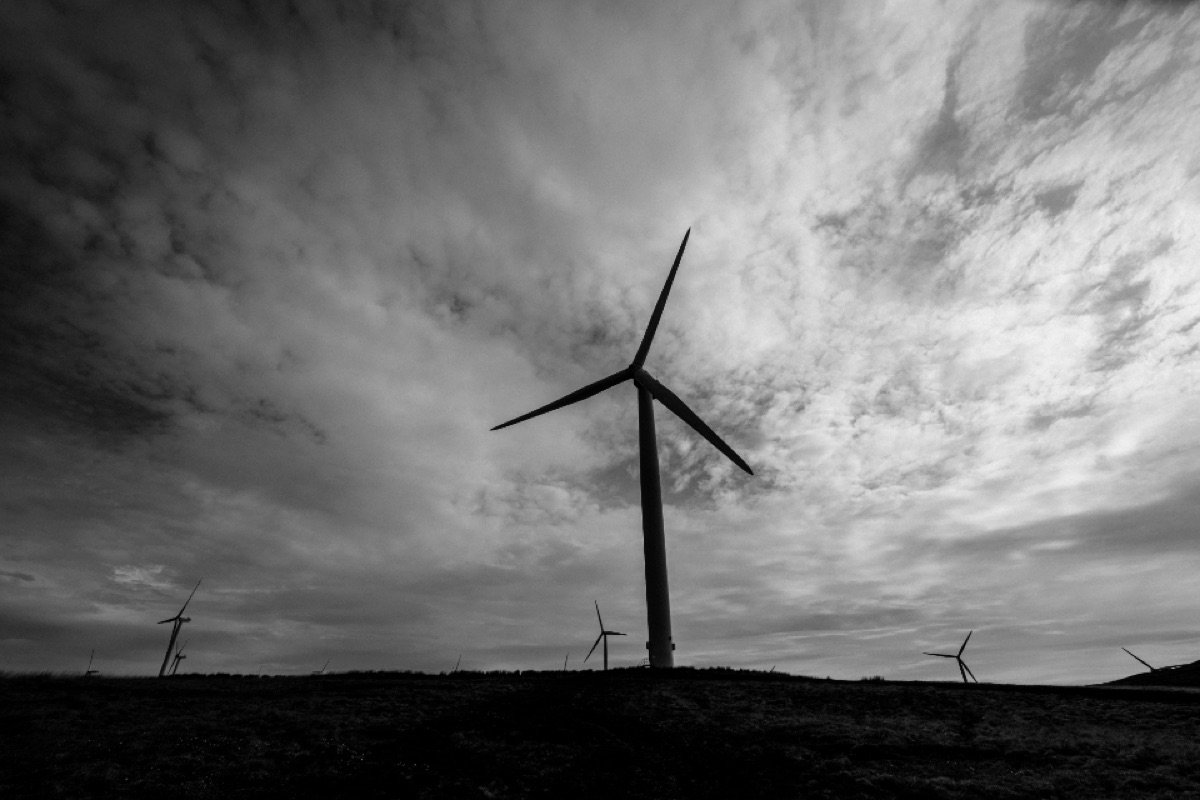 Wind turbines against a dramatic sky